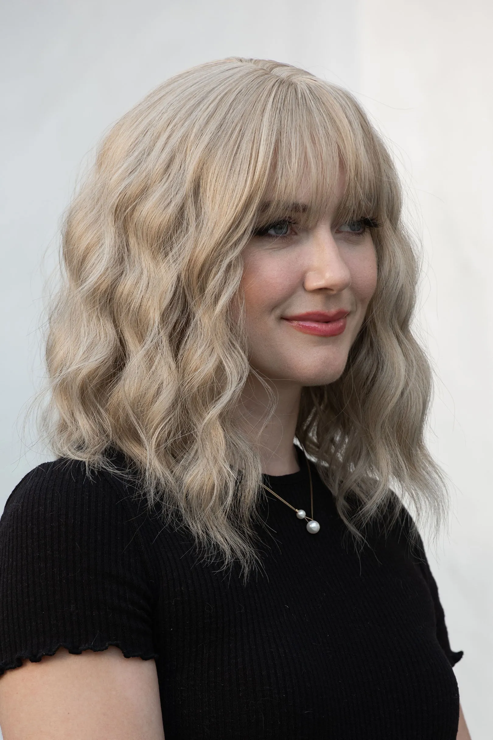 Ash Blonde Wavy Synthetic Wig with Bangs Alicia