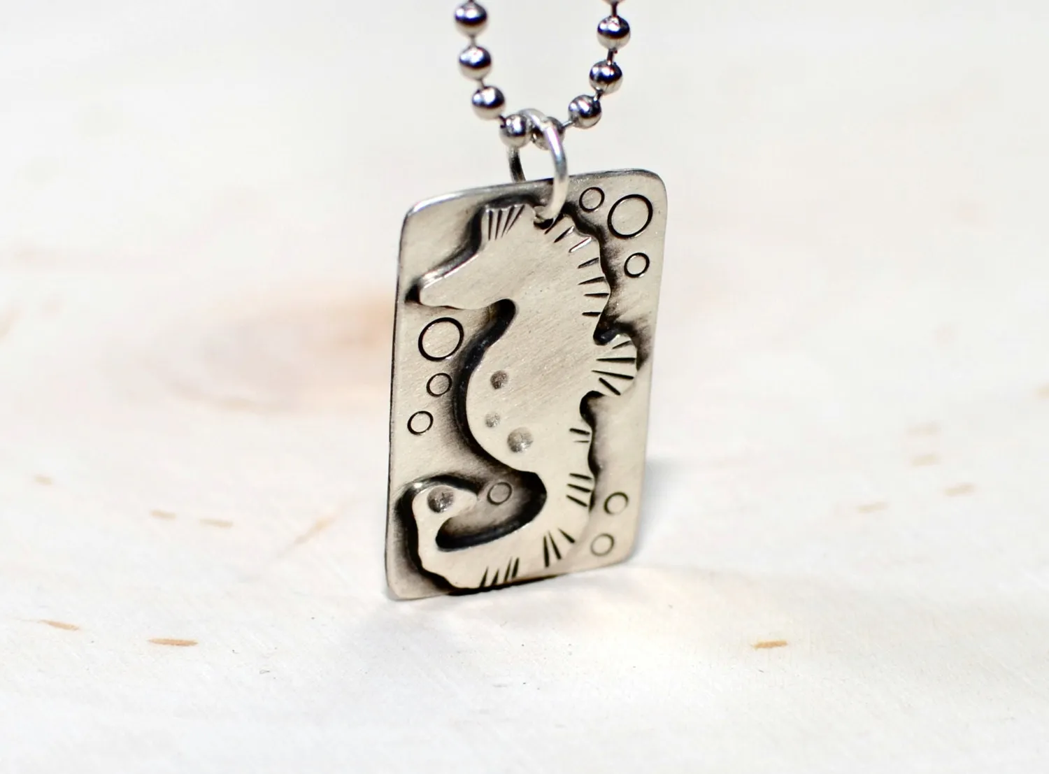 Handcrafted seahorse on sterling silver necklace