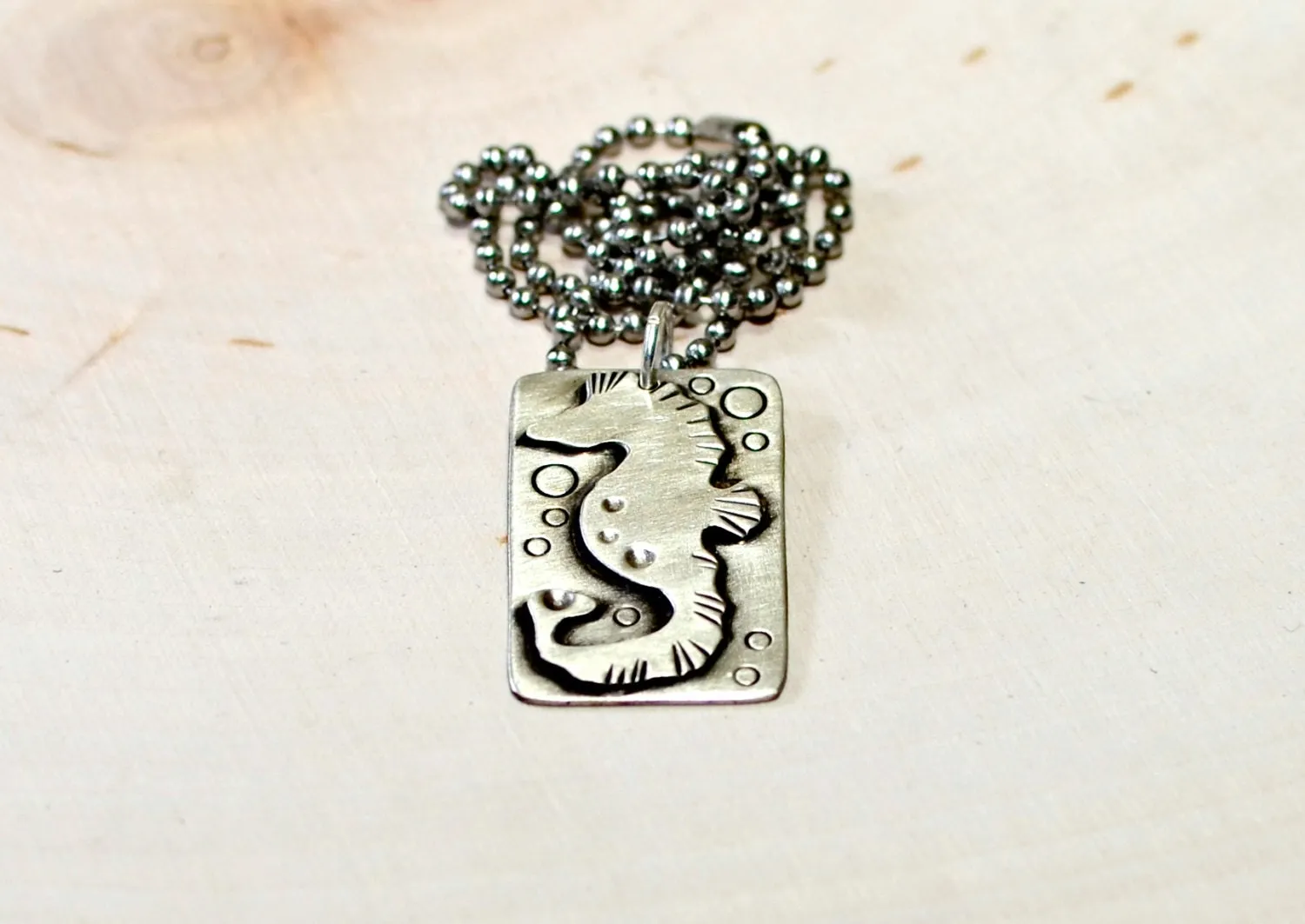 Handcrafted seahorse on sterling silver necklace