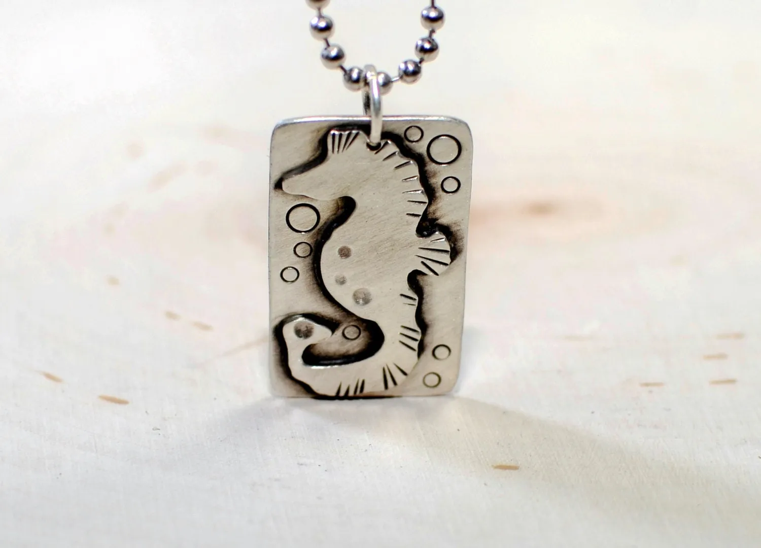 Handcrafted seahorse on sterling silver necklace