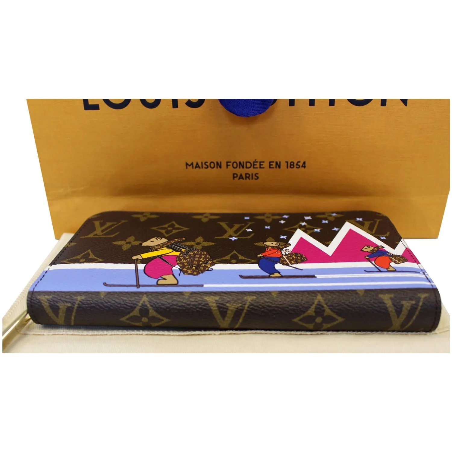 LOUIS VUITTON Holiday Zippy Monogram Canvas Wallet Brown