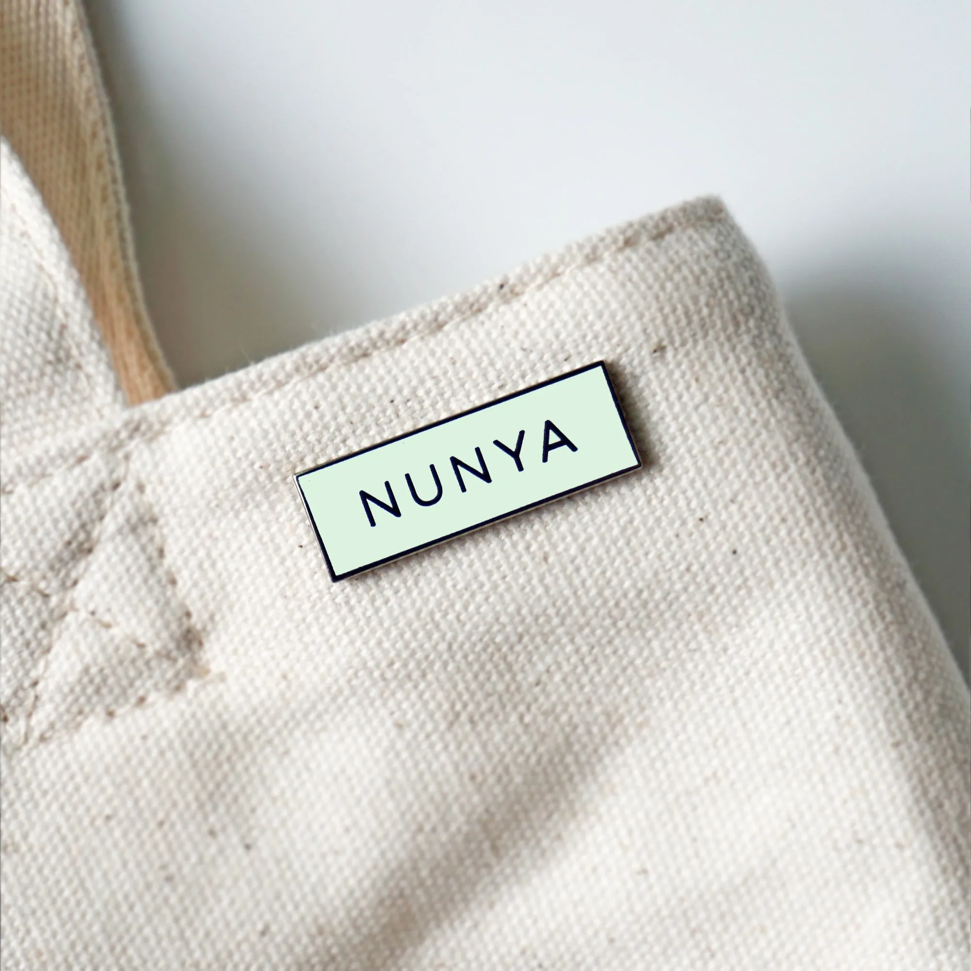 Nunya 'None of your Business' Meme (Glow in the Dark) Lapel Enamel Pin